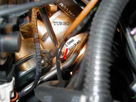 07-Loosening-clamp-on-air-inlet-at-turbo